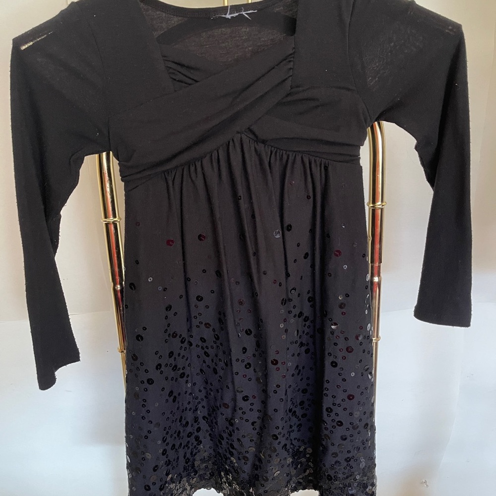 Little sequined black dress on sale today